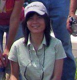 Dr. Karen Liu poses on the Ford Truck Plant green roof in Michigan while working with Xero Flor International and collaborating with Xeroflor North America